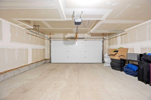 617-20295 Seton Way Se, Calgary, AB - Indoor Photo Showing Garage