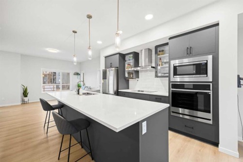 617-20295 Seton Way Se, Calgary, AB - Indoor Photo Showing Kitchen With Double Sink With Upgraded Kitchen