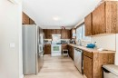 139 Bermuda Drive Nw, Calgary, AB  - Indoor Photo Showing Kitchen With Double Sink 