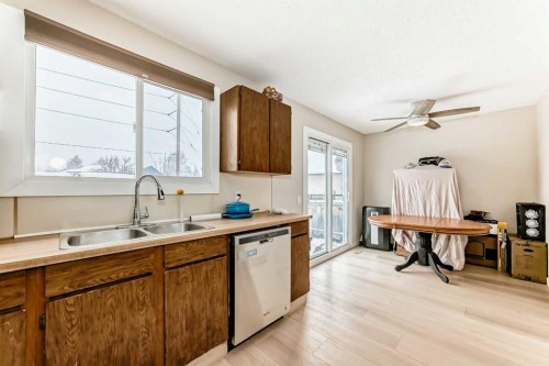 139 Bermuda Drive Nw, Calgary, AB - Indoor Photo Showing Kitchen With Double Sink