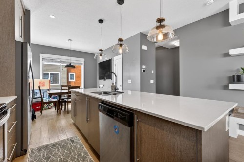 43-111 Rainbow Falls, Chestermere, AB - Indoor Photo Showing Kitchen With Upgraded Kitchen