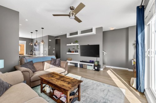 43-111 Rainbow Falls, Chestermere, AB - Indoor Photo Showing Living Room