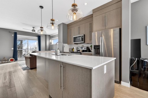 43-111 Rainbow Falls, Chestermere, AB - Indoor Photo Showing Kitchen With Stainless Steel Kitchen With Upgraded Kitchen