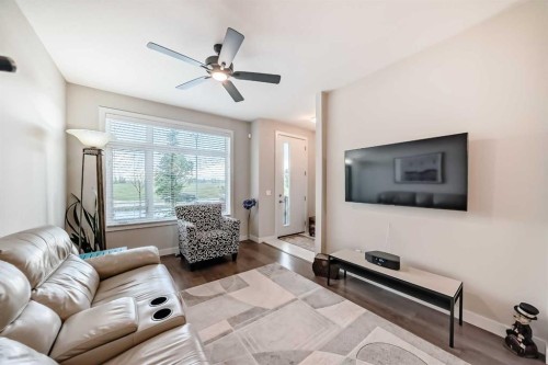 342 Redstone Boulevard Ne, Calgary, AB - Indoor Photo Showing Living Room