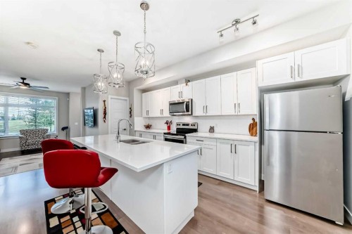 342 Redstone Boulevard Ne, Calgary, AB - Indoor Photo Showing Kitchen With Double Sink With Upgraded Kitchen
