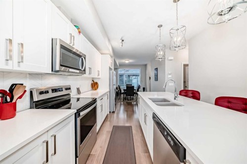 342 Redstone Boulevard Ne, Calgary, AB - Indoor Photo Showing Kitchen With Double Sink With Upgraded Kitchen
