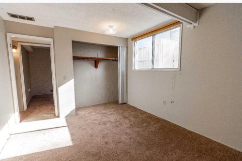 92 Queen Isabella Close Se, Calgary, AB - Indoor Photo Showing Other Room