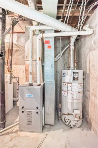 92 Queen Isabella Close Se, Calgary, AB - Indoor Photo Showing Basement