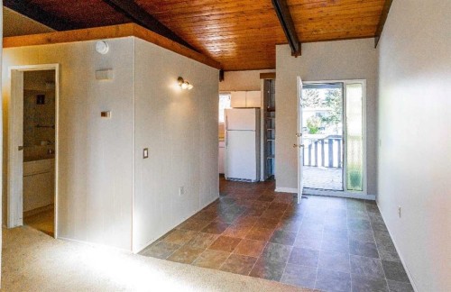 92 Queen Isabella Close Se, Calgary, AB - Indoor Photo Showing Other Room