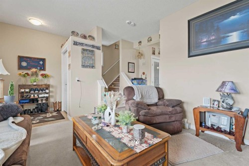 40 Cimarron Grove Drive, Okotoks, AB - Indoor Photo Showing Living Room
