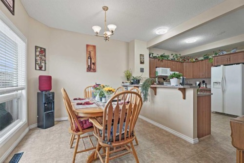 40 Cimarron Grove Drive, Okotoks, AB - Indoor Photo Showing Dining Room