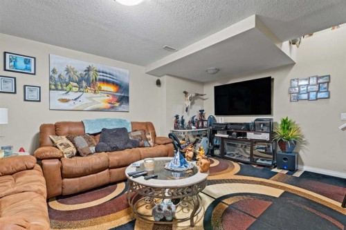 40 Cimarron Grove Drive, Okotoks, AB - Indoor Photo Showing Living Room