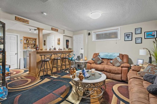40 Cimarron Grove Drive, Okotoks, AB - Indoor Photo Showing Living Room
