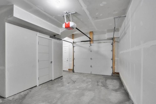 239 Saddlepeace Crescent Ne, Calgary, AB - Indoor Photo Showing Garage