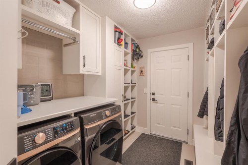 77 Weston Way Sw, Calgary, AB - Indoor Photo Showing Laundry Room
