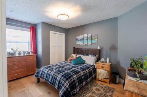 77 Weston Way Sw, Calgary, AB - Indoor Photo Showing Bedroom