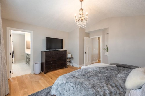 77 Weston Way Sw, Calgary, AB - Indoor Photo Showing Bedroom