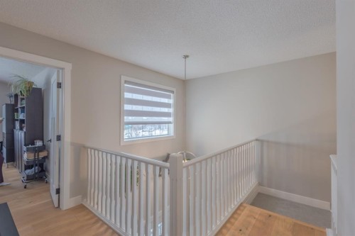 77 Weston Way Sw, Calgary, AB - Indoor Photo Showing Other Room