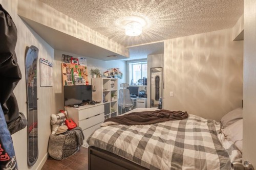 77 Weston Way Sw, Calgary, AB - Indoor Photo Showing Bedroom