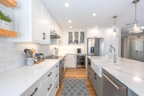 77 Weston Way Sw, Calgary, AB - Indoor Photo Showing Kitchen With Stainless Steel Kitchen With Upgraded Kitchen