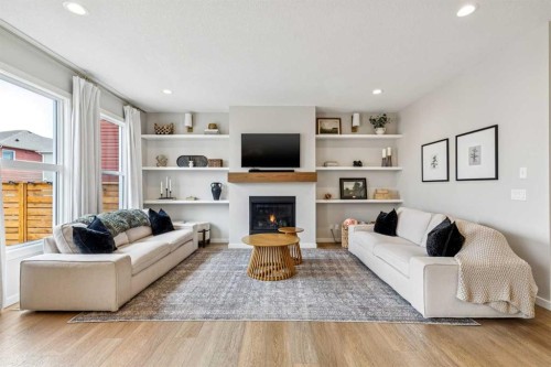 44 Legacy Landing Se, Calgary, AB - Indoor Photo Showing Living Room With Fireplace