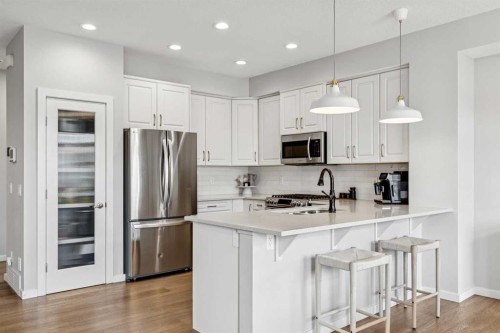 44 Legacy Landing Se, Calgary, AB - Indoor Photo Showing Kitchen With Stainless Steel Kitchen With Upgraded Kitchen