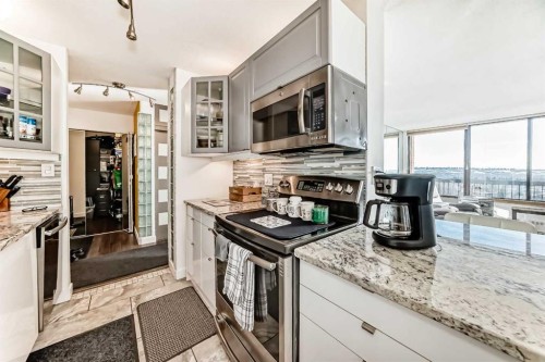 #912-8604 48 Avenue Nw, Calgary, AB - Indoor Photo Showing Kitchen With Stainless Steel Kitchen With Upgraded Kitchen