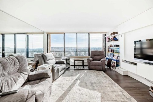 #912-8604 48 Avenue Nw, Calgary, AB - Indoor Photo Showing Living Room