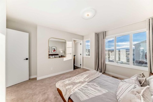 277 Cobblestone Gate, Airdrie, AB - Indoor Photo Showing Bedroom