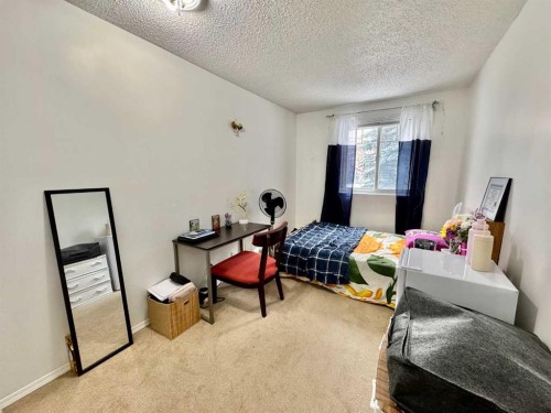208C-5601 Dalton Drive Nw, Calgary, AB - Indoor Photo Showing Bedroom