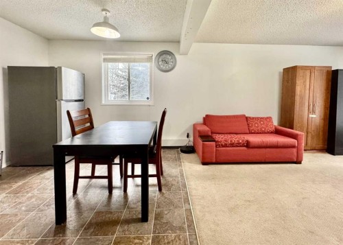 208C-5601 Dalton Drive Nw, Calgary, AB - Indoor Photo Showing Dining Room