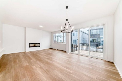 58 Walgrove Bay Se, Calgary, AB - Indoor Photo Showing Other Room With Fireplace