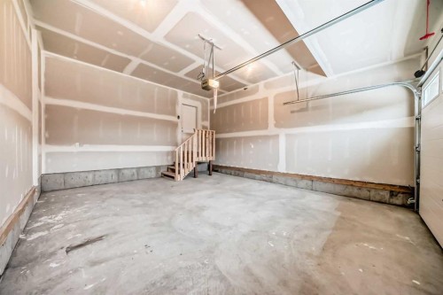 58 Walgrove Bay Se, Calgary, AB - Indoor Photo Showing Garage