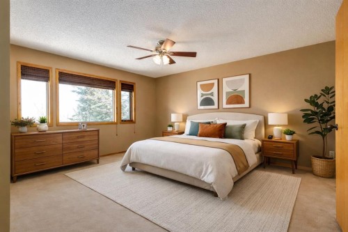 55 Oakmount Court Sw, Calgary, AB - Indoor Photo Showing Bedroom