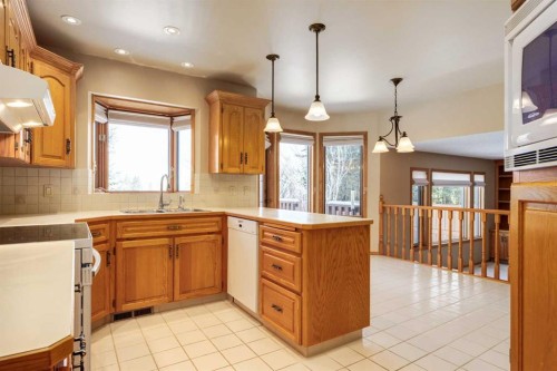 55 Oakmount Court Sw, Calgary, AB - Indoor Photo Showing Kitchen With Double Sink
