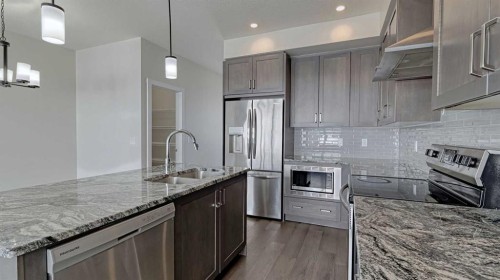 282 Alpine Avenue Sw, Calgary, AB - Indoor Photo Showing Kitchen With Double Sink With Upgraded Kitchen