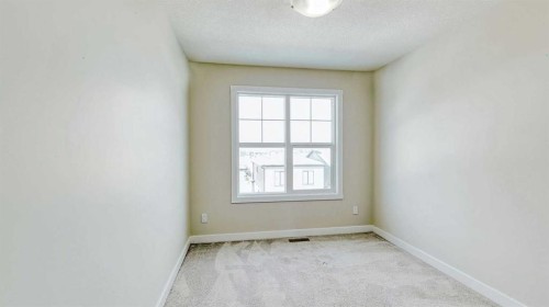 282 Alpine Avenue Sw, Calgary, AB - Indoor Photo Showing Other Room
