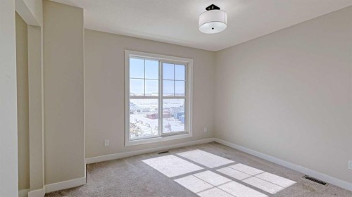282 Alpine Avenue Sw, Calgary, AB - Indoor Photo Showing Other Room