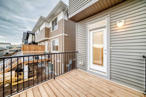 62 Starling Boulevard Nw, Calgary, AB - Outdoor With Deck Patio Veranda With Exterior