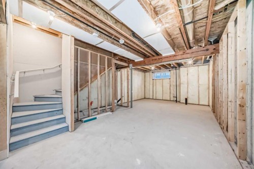 62 Starling Boulevard Nw, Calgary, AB - Indoor Photo Showing Basement