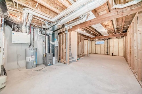 62 Starling Boulevard Nw, Calgary, AB - Indoor Photo Showing Basement
