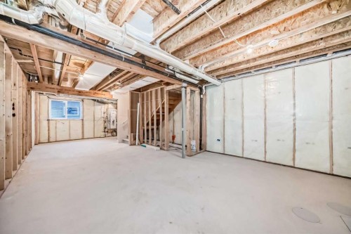 62 Starling Boulevard Nw, Calgary, AB - Indoor Photo Showing Basement