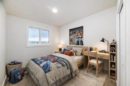 62 Starling Boulevard Nw, Calgary, AB - Indoor Photo Showing Bedroom