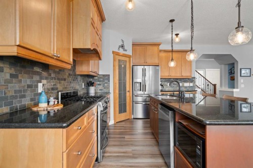 102 Morningside Point Sw, Airdrie, AB - Indoor Photo Showing Kitchen With Upgraded Kitchen