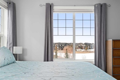102 Morningside Point Sw, Airdrie, AB - Indoor Photo Showing Bedroom