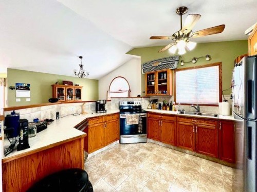 4723 50 Avenue, Irma, AB - Indoor Photo Showing Kitchen With Double Sink