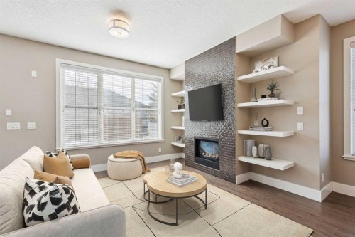 442 Quarry Park Boulevard Se, Calgary, AB - Indoor Photo Showing Other Room With Fireplace