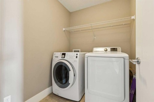 442 Quarry Park Boulevard Se, Calgary, AB - Indoor Photo Showing Laundry Room