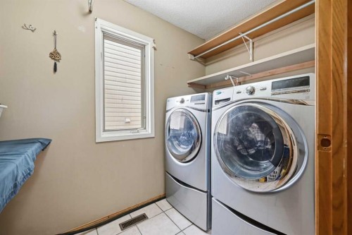 64 Eldorado Close Ne, Calgary, AB - Indoor Photo Showing Laundry Room