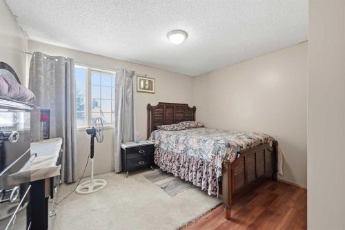 64 Eldorado Close Ne, Calgary, AB - Indoor Photo Showing Bedroom